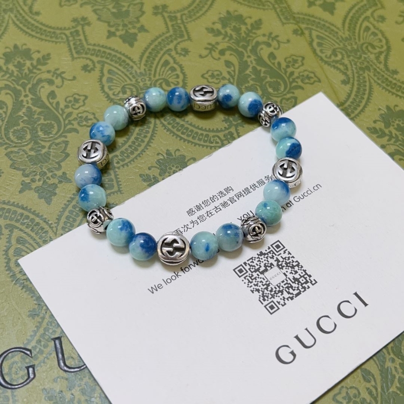 G*u*i bracelets